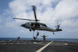 Force Recon Marines practice taking ships at sea