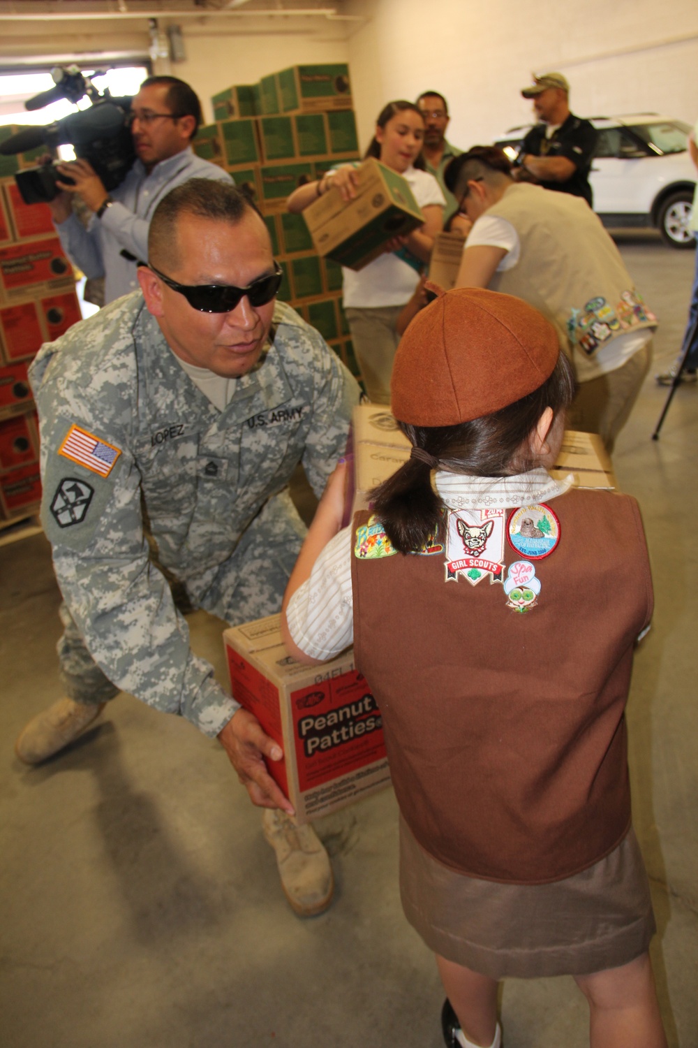Girls Scouts donate cookies to deployed service members