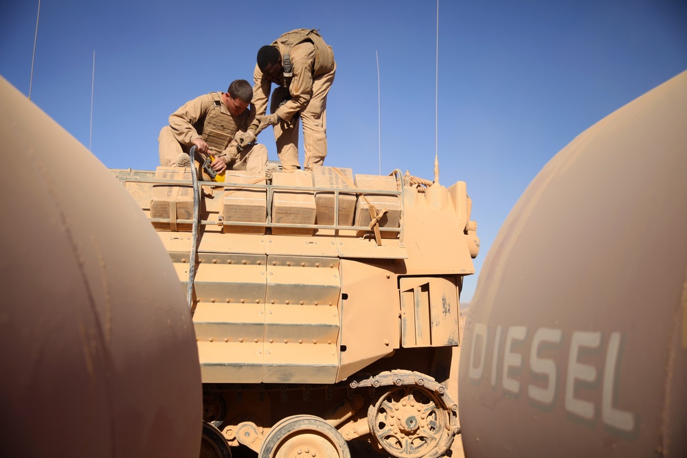 US Marines refuel vehicles in Jordan