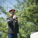 A ceremony honoring Hmong and Lao combat veterans at the memorial tree and plaque in Arlington National Cemetery