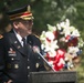 A ceremony honoring Hmong and Lao combat veterans at the memorial tree and plaque in Arlington National Cemetery