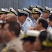 Crewmembers watch the Eighth District change of command