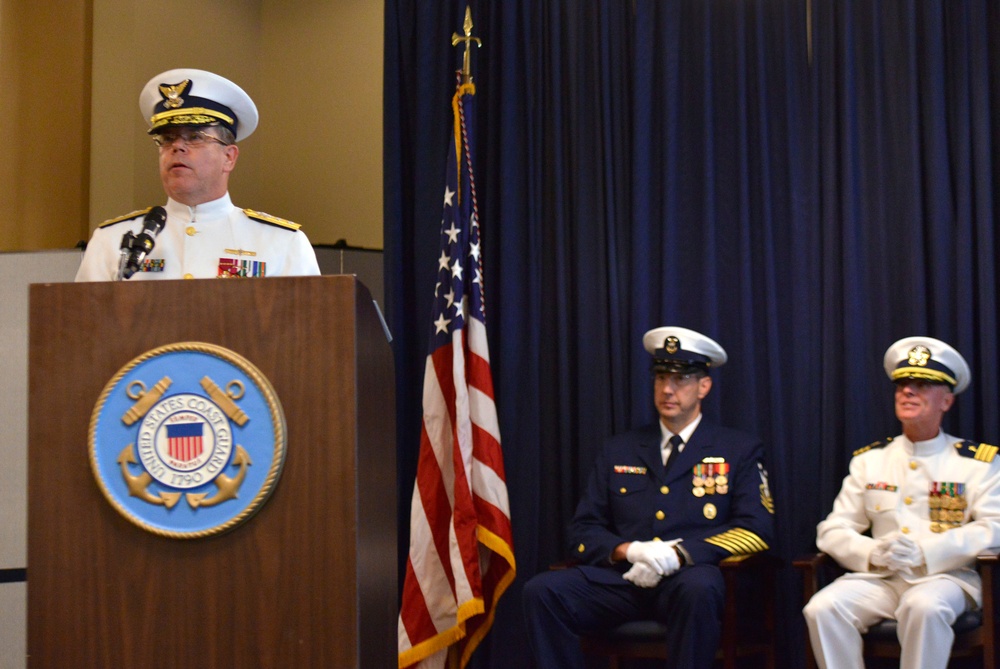 Rear Adm. Kevin S. Cook speaks to Eighth District members