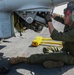 US Marines make sure helicopter's weapons are ready to fire at sea