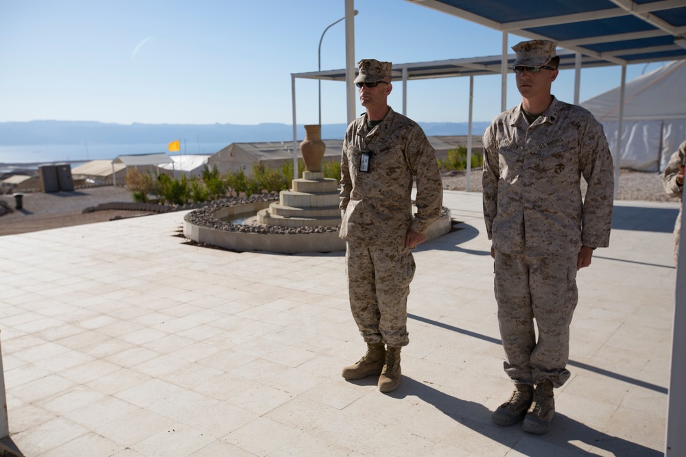 Marine receives diploma during multi-national exercise