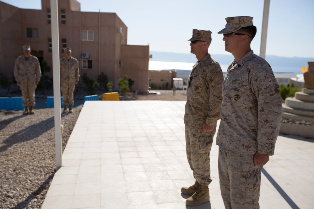 Marine receives diploma during multi-national exercise