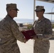 Marine receives diploma during multi-national exercise