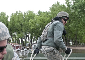 Bridging the Mississippi: Army Reserve bridge companies raft Mississippi during WAREX
