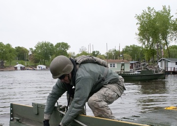 Bridging the Mississippi: Army Reserve bridge companies raft Mississippi during WAREX