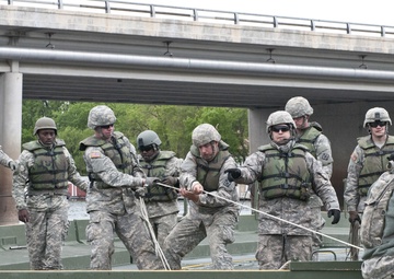 Bridging the Mississippi: Army Reserve bridge companies raft Mississippi during WAREX