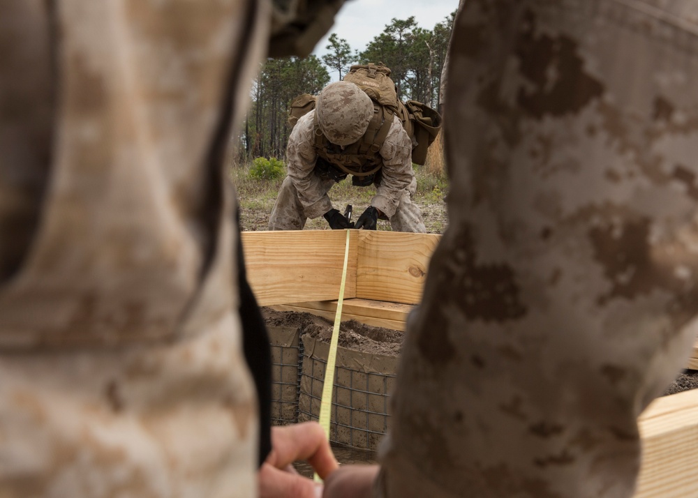 Built by hand: Marines with 8th ESB build a non-standard bridge