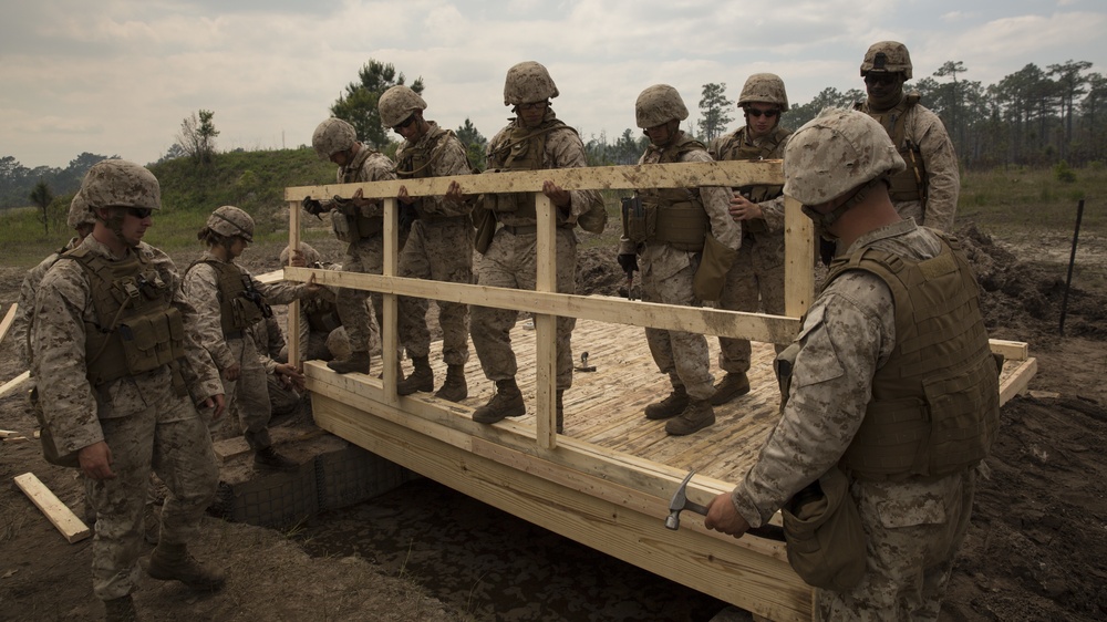 Built by hand: Marines with 8th ESB build a non-standard bridge