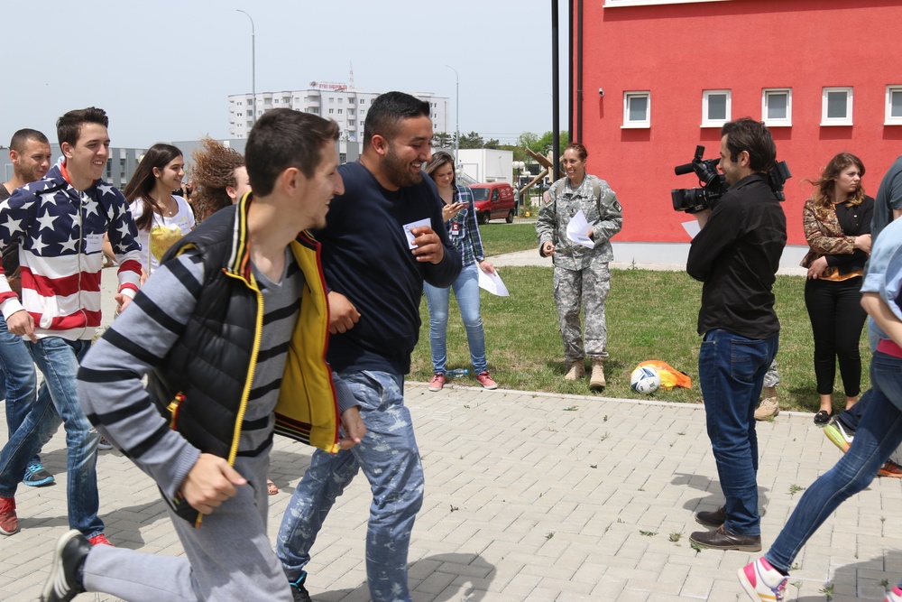 KFOR Soldiers volunteer for Play 2 Educate Project