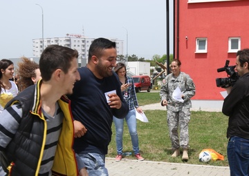 KFOR Soldiers volunteer for Play 2 Educate Project