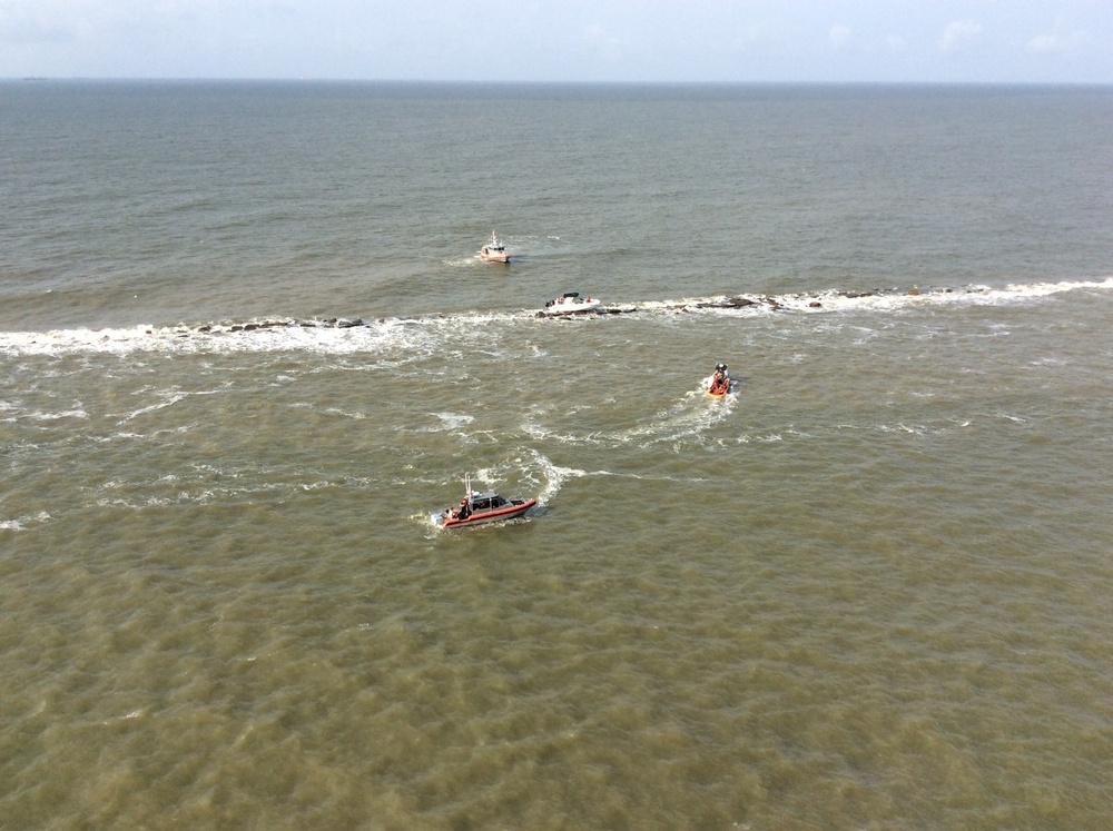 Coast Guard, Galveston Island Beach Patrol rescue 3 from aground boat