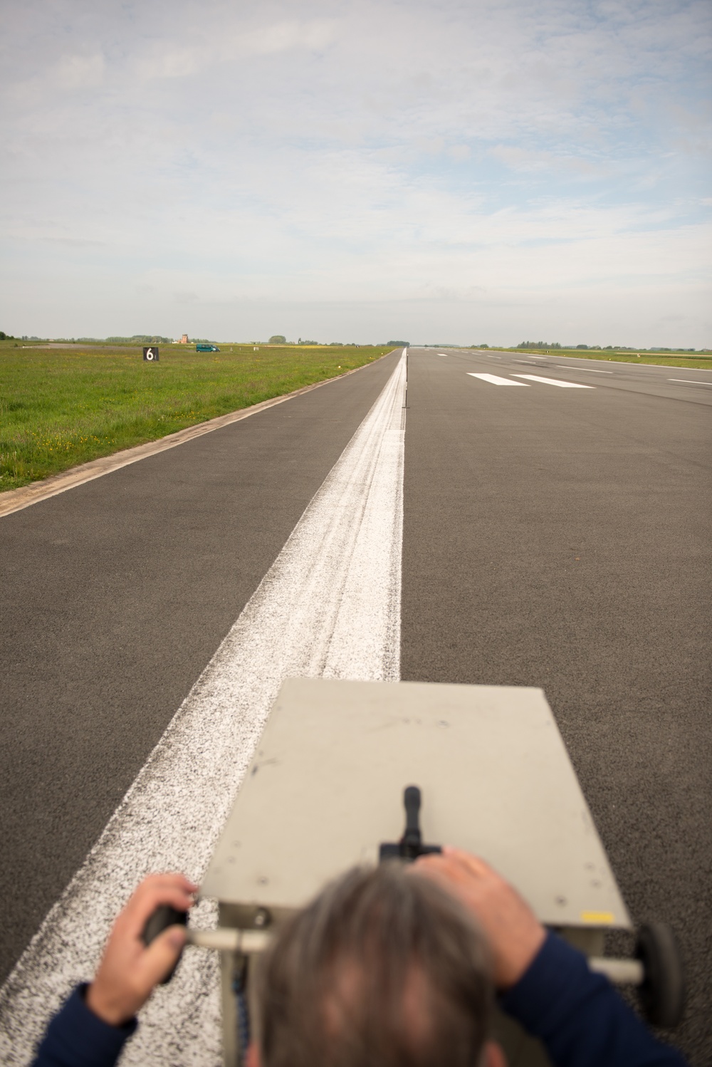 Belgian Police, US Military Police calibrate speedometers on Chièvres Air Base's airfield