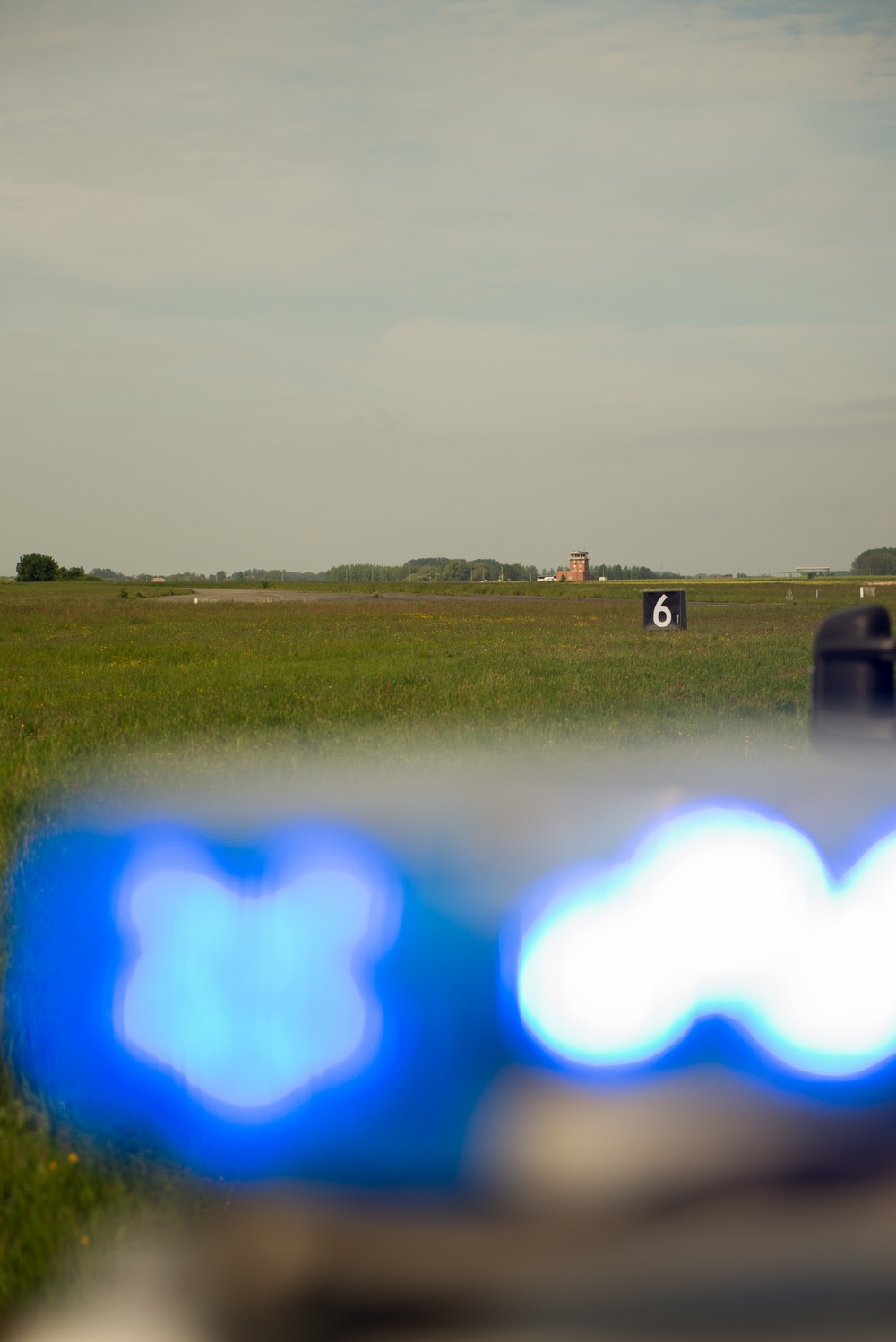 Belgian Police, US Military Police calibrate speedometers on Chièvres Air Base's airfield