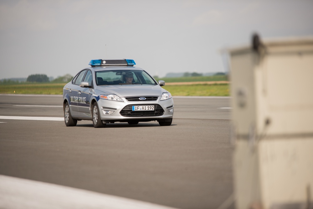 Belgian Police, US Military Police calibrate speedometers on Chièvres Air Base's airfield