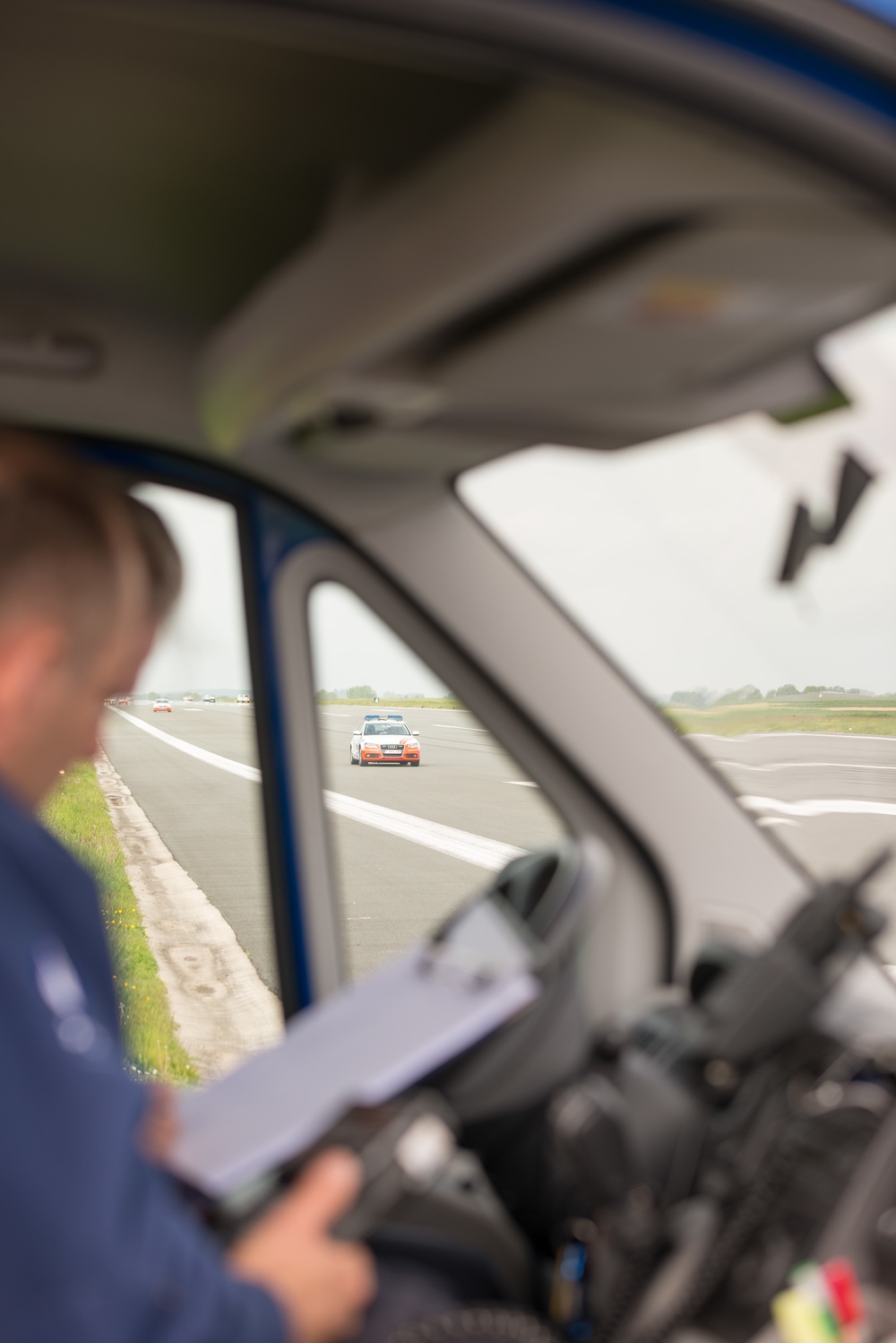 Belgian Police, US Military Police calibrate speedometers on Chièvres Air Base's airfield