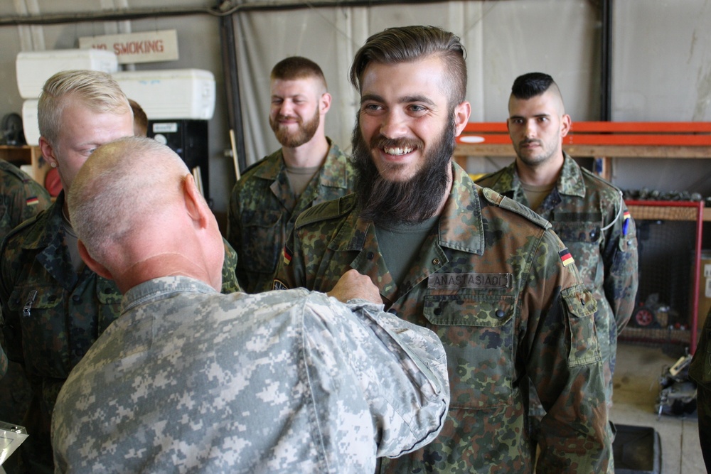 US Soldiers receive German army badges