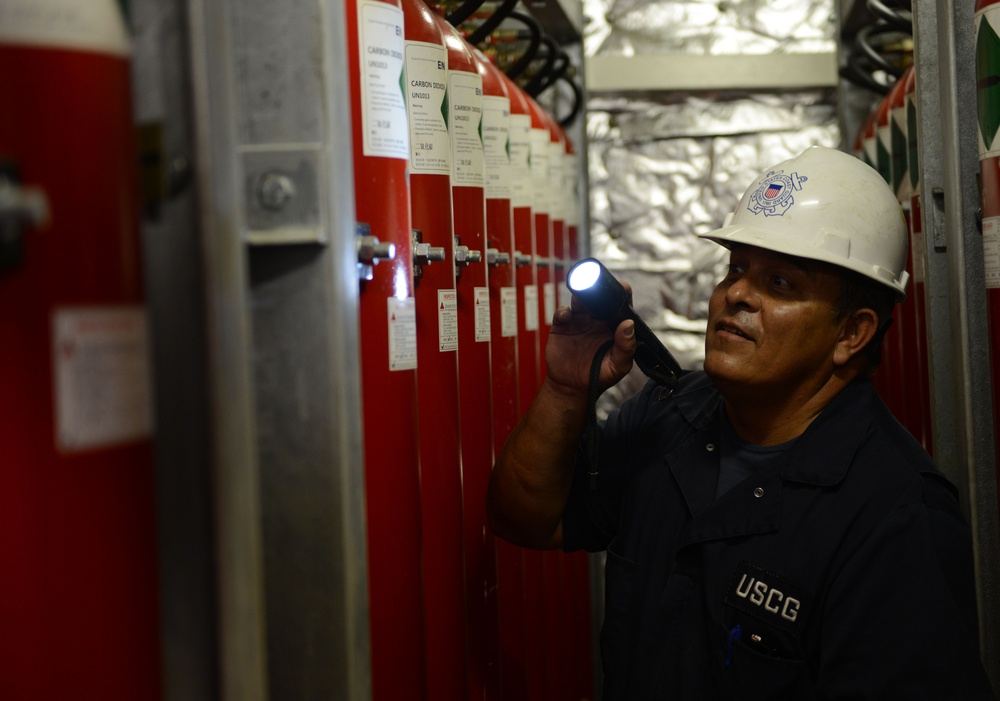 Coast Guard crew members conduct ship inspection