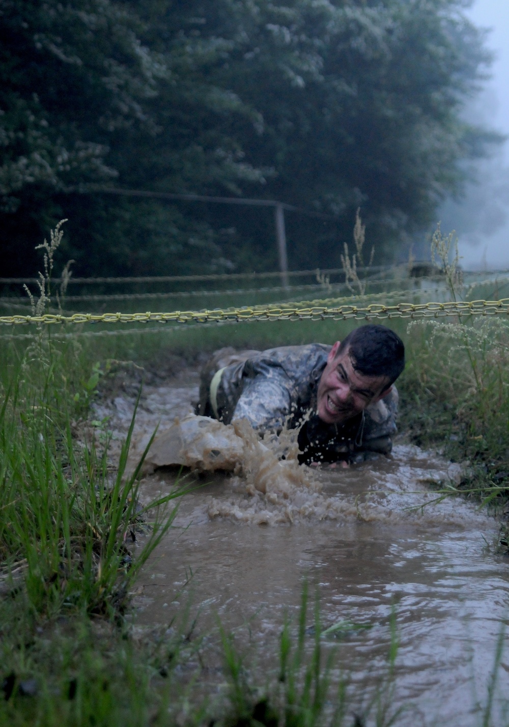 Getting muddy and building a team: Soldiers take on obstacle course at annual training