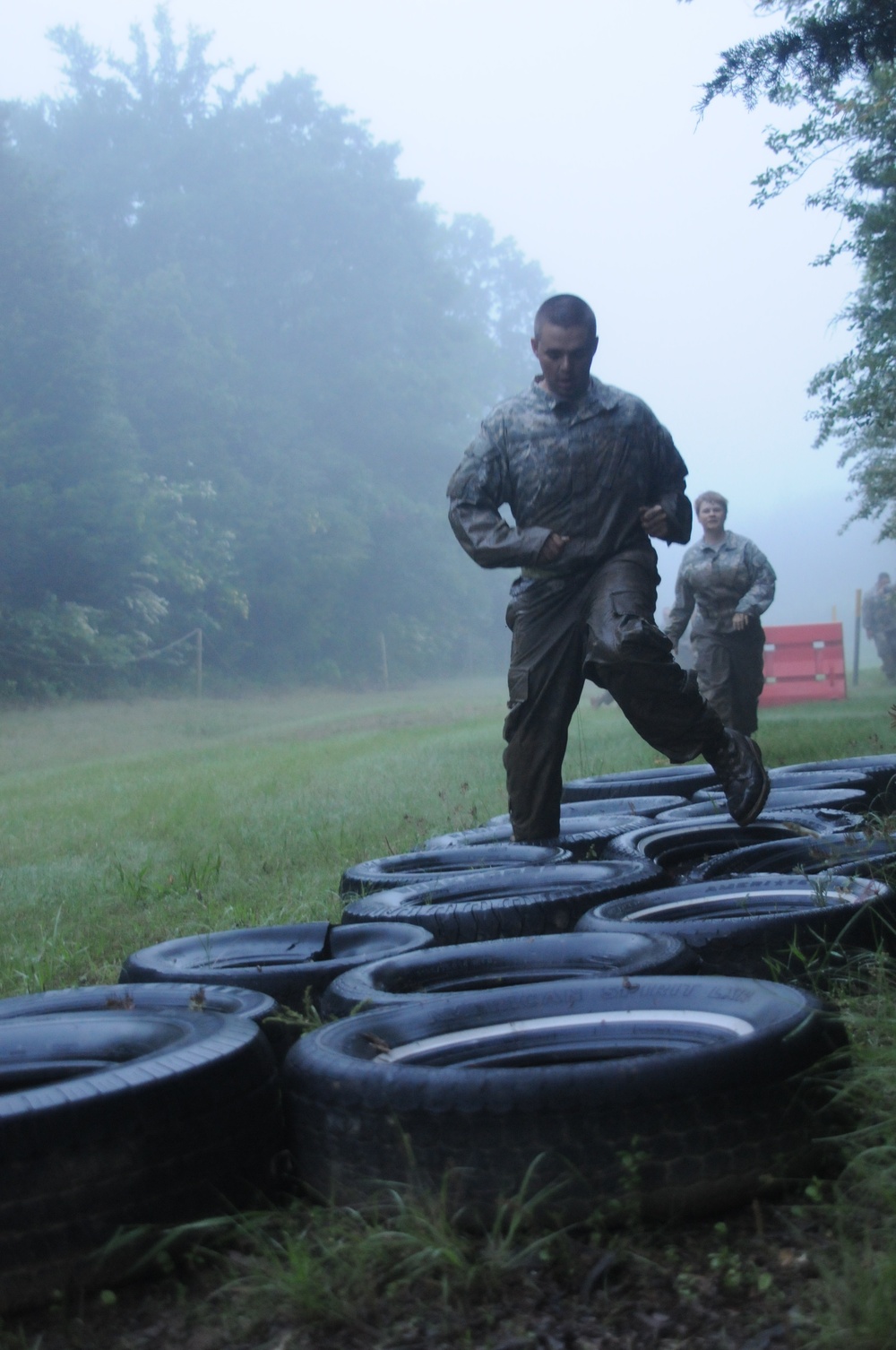 Getting muddy and building a team: Soldiers take on obstacle course at annual training