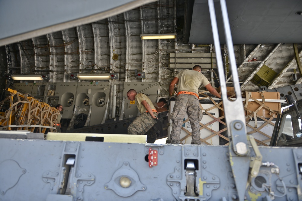 C-17 and Expeditionary Airman support RED HORSE runway mission