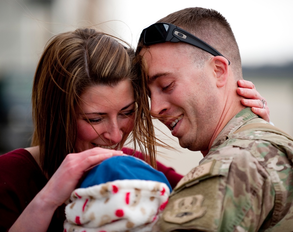 Deployed Airman reunites with wife and baby