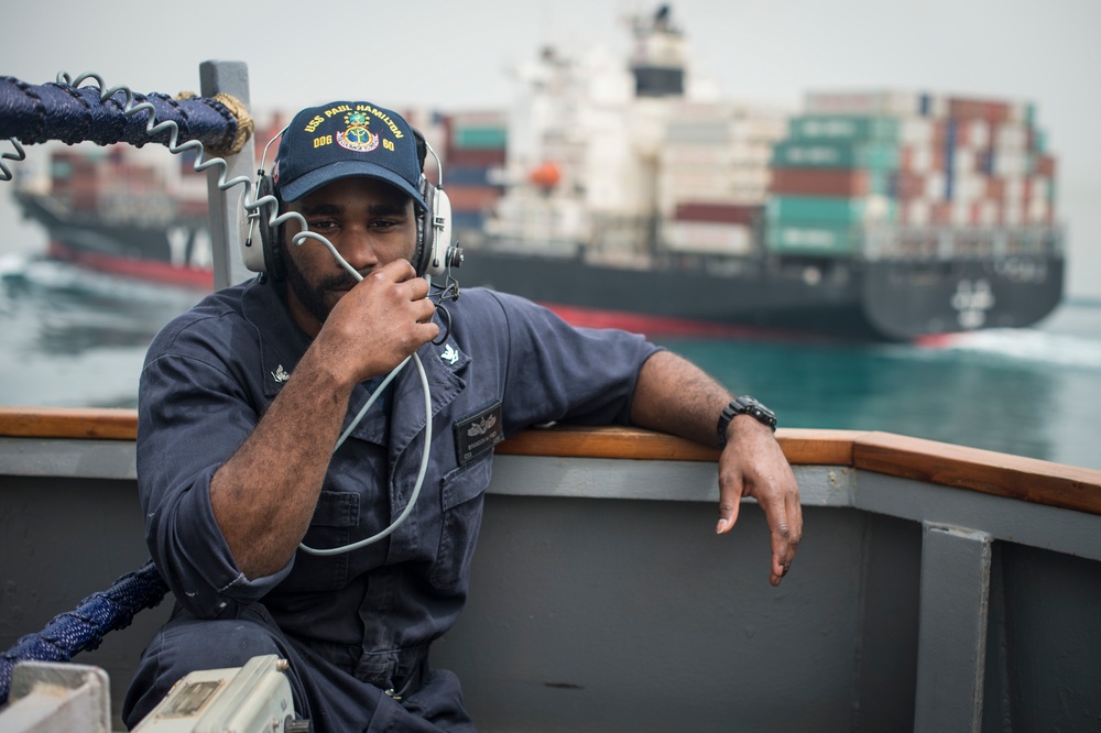 Sailors pull into port