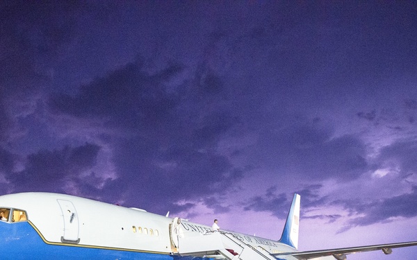 Lightning illuminates violet skies over Andrews