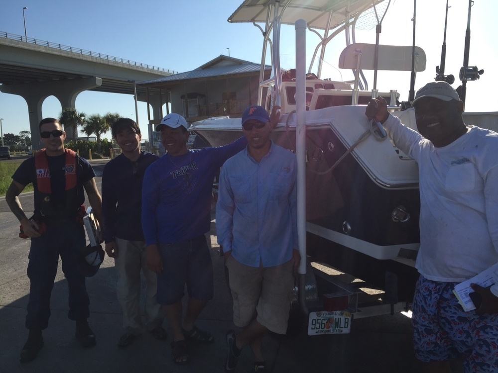 Coast Guard rescues 4 people after boat takes on water near Sand Key Bridge
