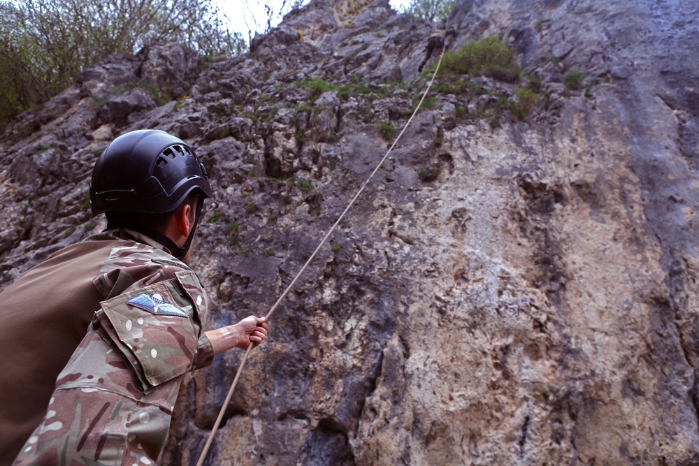Royal Marines and U.S. Marines climb the Carpathians
