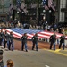 JROTC cadets march presenting the American flag in Chicago