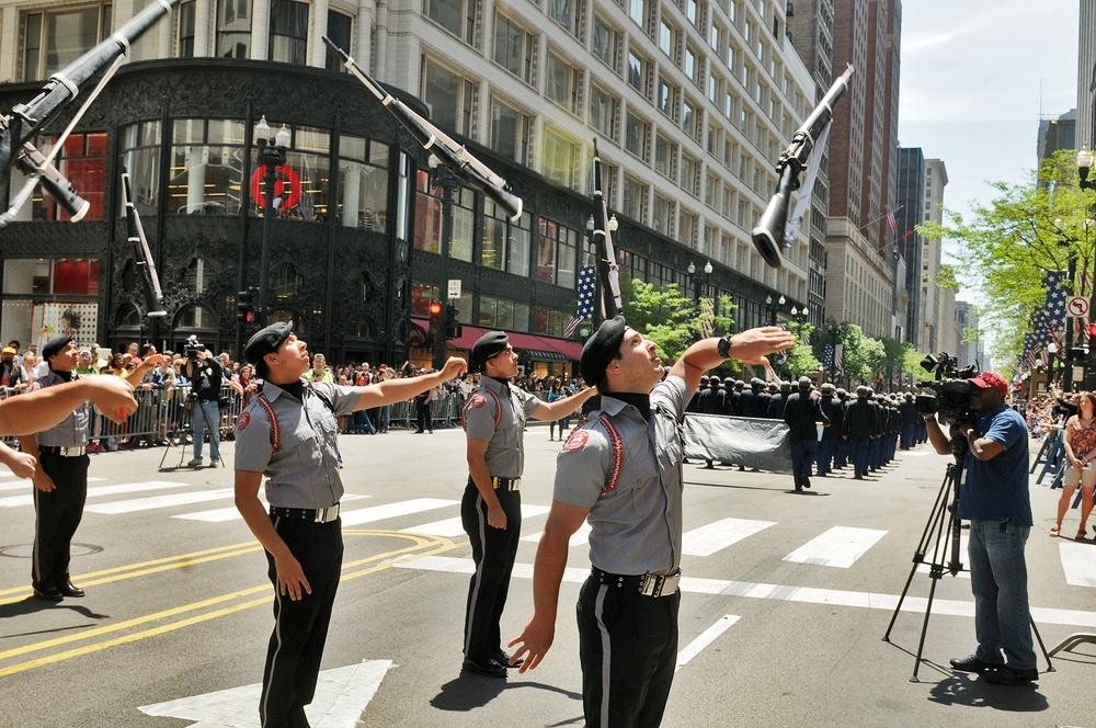 JROTC cadets perform a drill routine at Chicago Memorial Day parade