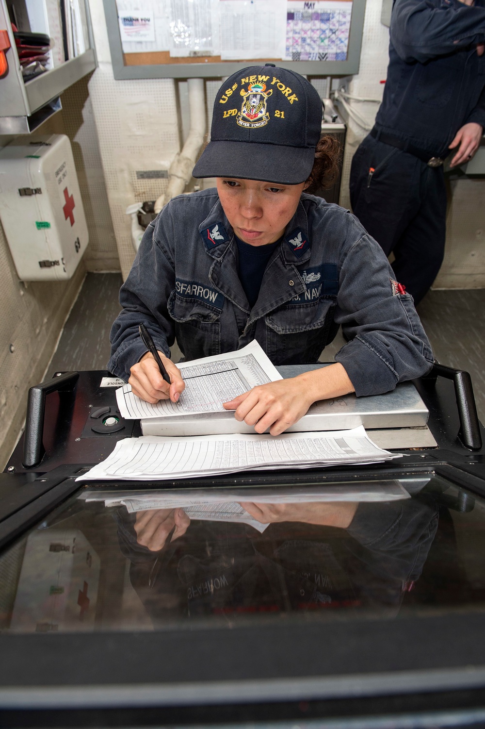 USS New York sailor takes readings
