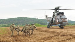 Soldiers evacuate casualty from battlefield