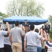 Army recruits are administered their oath by Army Reserve general during Memorial Day