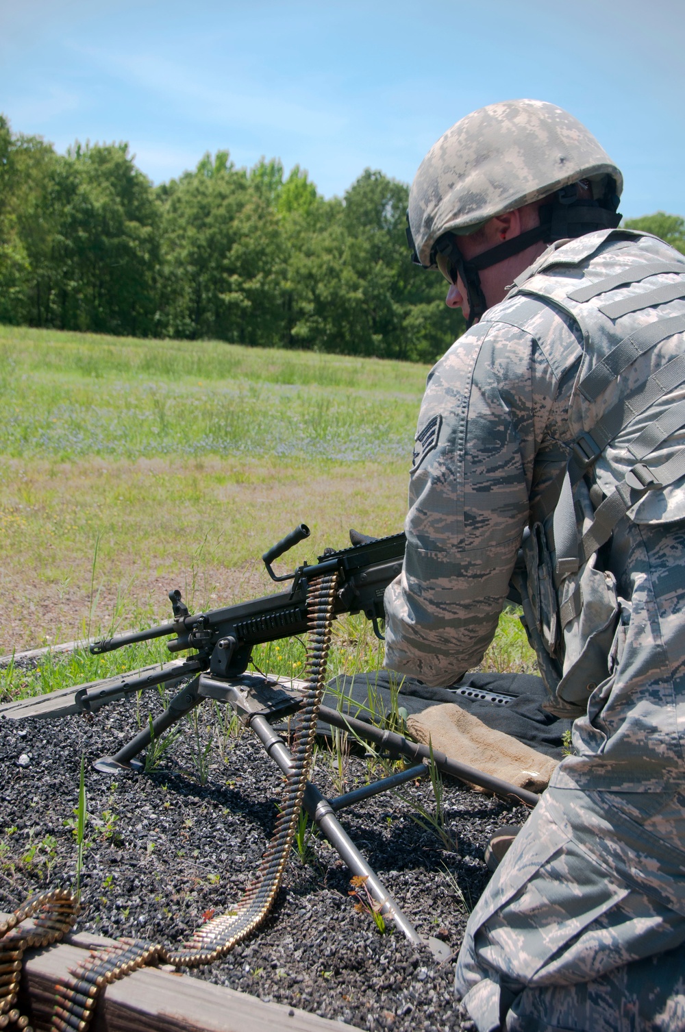 Security Forces Squadron members train to use the M203 and the M249