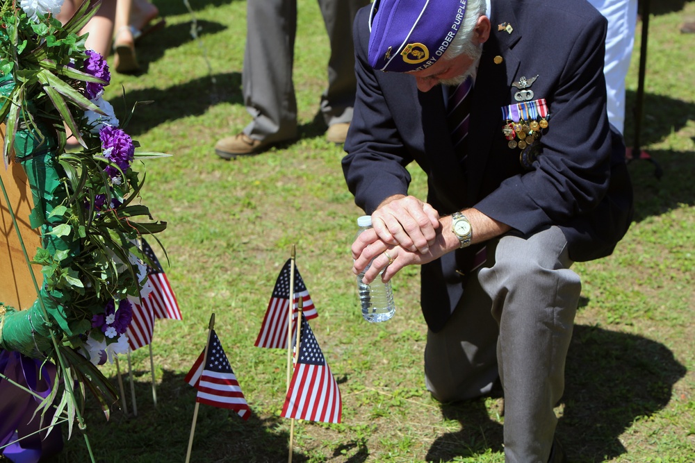 Service members, community, gather to remember fallen