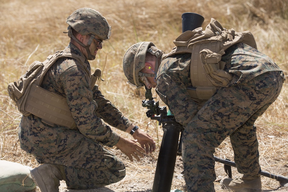 Marines with MRF-D fire 81 mm mortars
