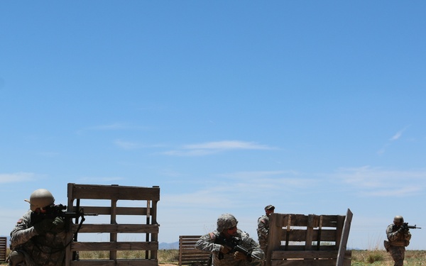 National Guard Soldiers charge through live-fire training