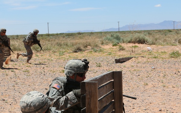 National Guard Soldiers charge through live-fire training