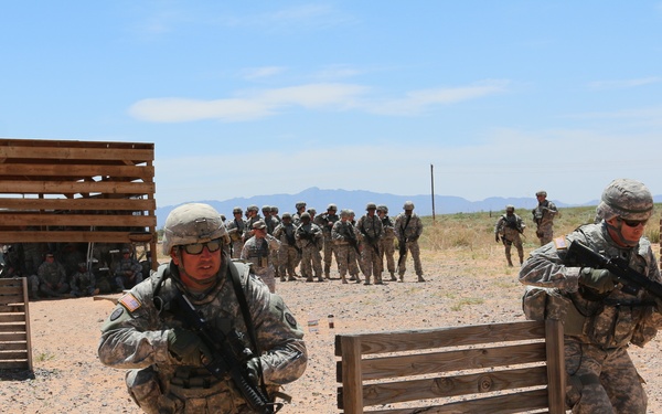 National Guard Soldiers charge through live-fire training