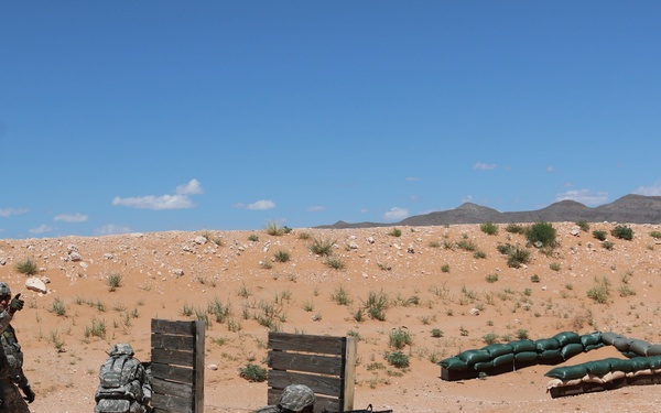 National Guard Soldiers charge through live-fire training