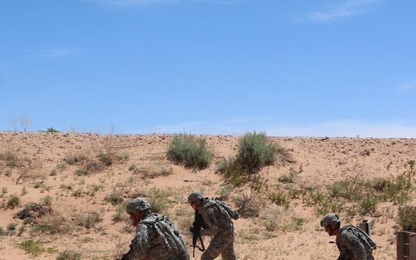 National Guard Soldiers charge through live-fire training