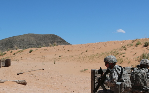 National Guard Soldiers charge through live-fire training