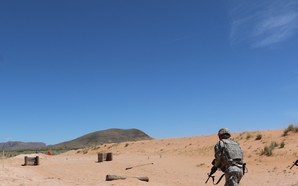 National Guard Soldiers charge through live-fire training