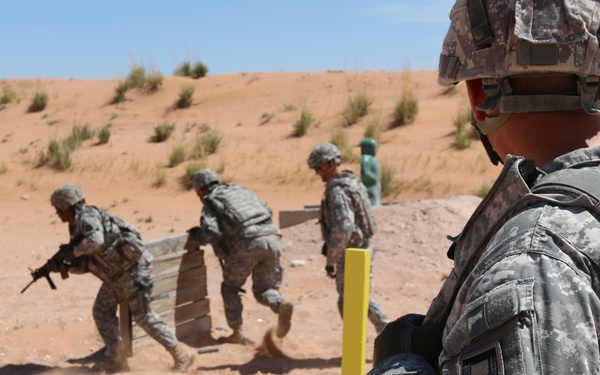 National Guard Soldiers charge through live-fire training