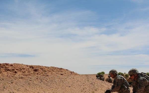 National Guard Soldiers charge through live-fire training